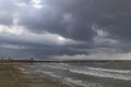 The beach of BenicÃÂ ssim-BenicÃÂ¡sim and the Mediterranean Sea joining with rainwater and floods producing a mixture of sediments l